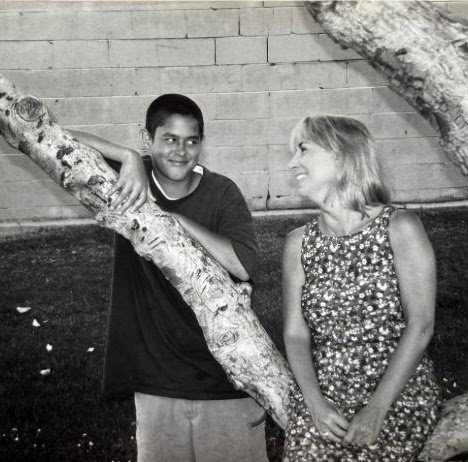 Michael and Kelly by a tree